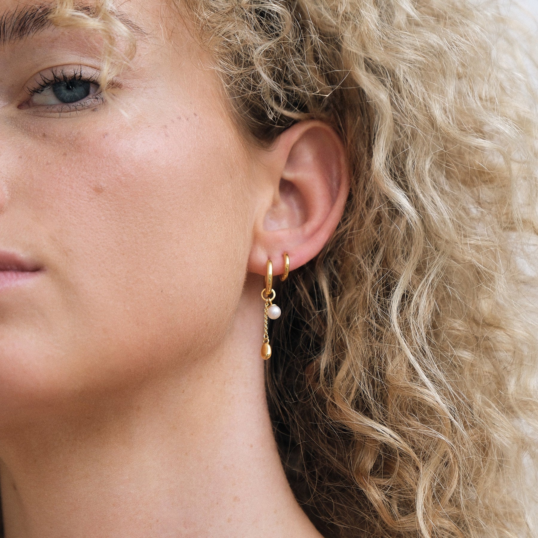 Lou Pearl Charm Huggie Earrings