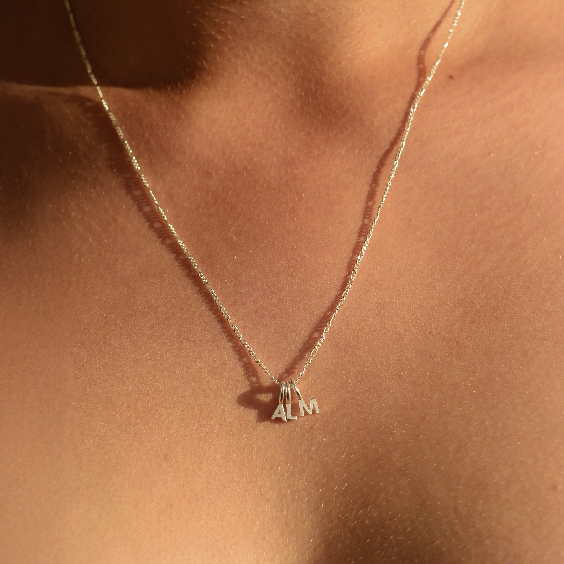 Tiny Letter Charm - Sterling Silver