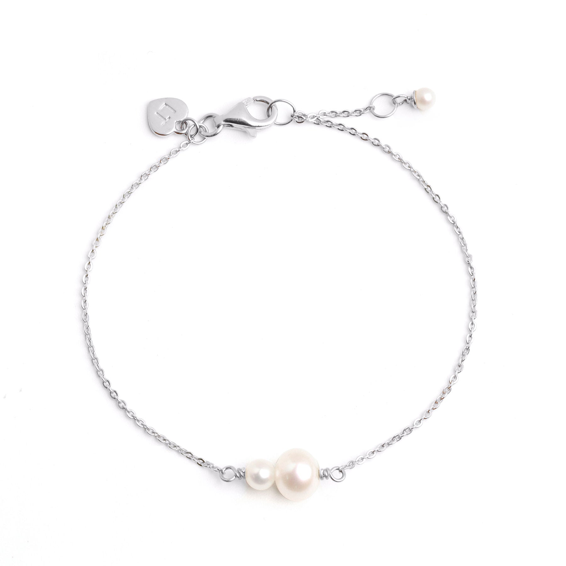 Close up image of a sterling silver double pearl bracelet.