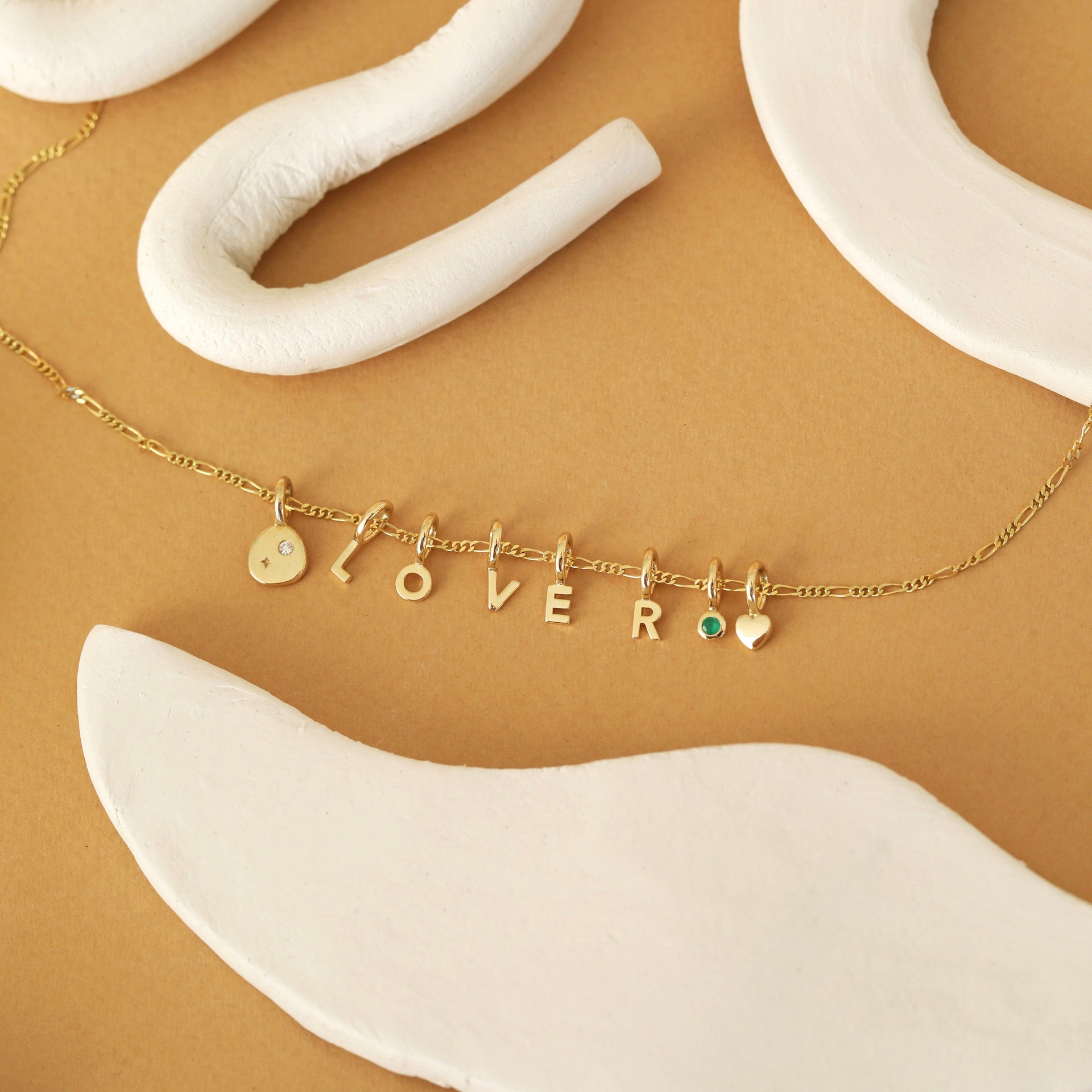 Tiny Letter Charm - 9k Gold