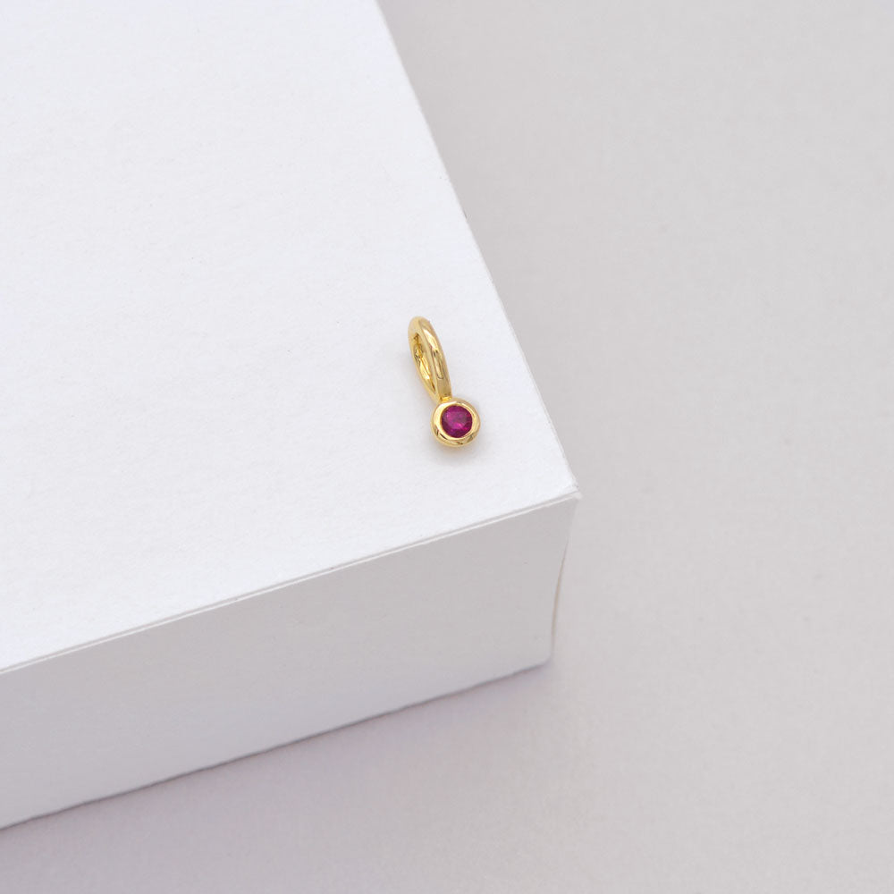 Tiny Ruby Charm - 9k Gold