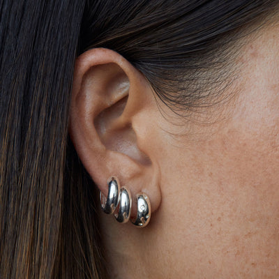 Solar Huggie Earrings Silver White Topaz Campaign