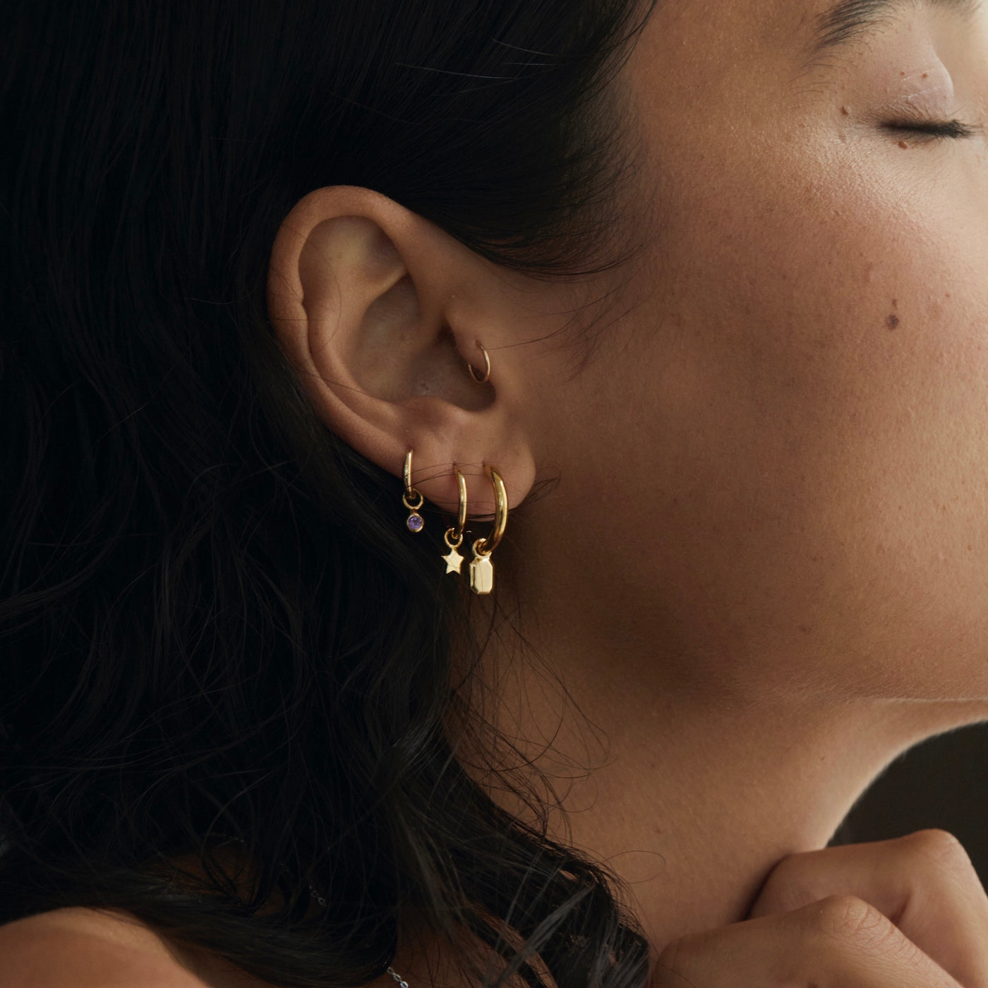 Tate Huggie Hoop Earrings Gold Campaign